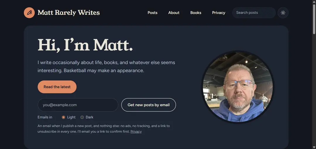 The top of the blog home page in dark mode: a Hi, I'm Matt greeting beside my photo, a Read the latest button, and an email box with a Get new posts by email button